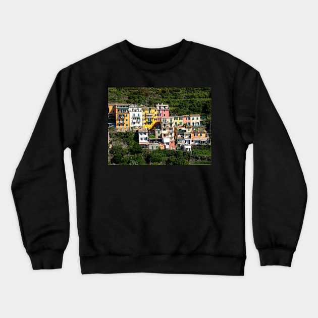 View on the cliff town of Manarola, one of the colorful Cinque Terre on the Italian west coast Crewneck Sweatshirt by Dolfilms